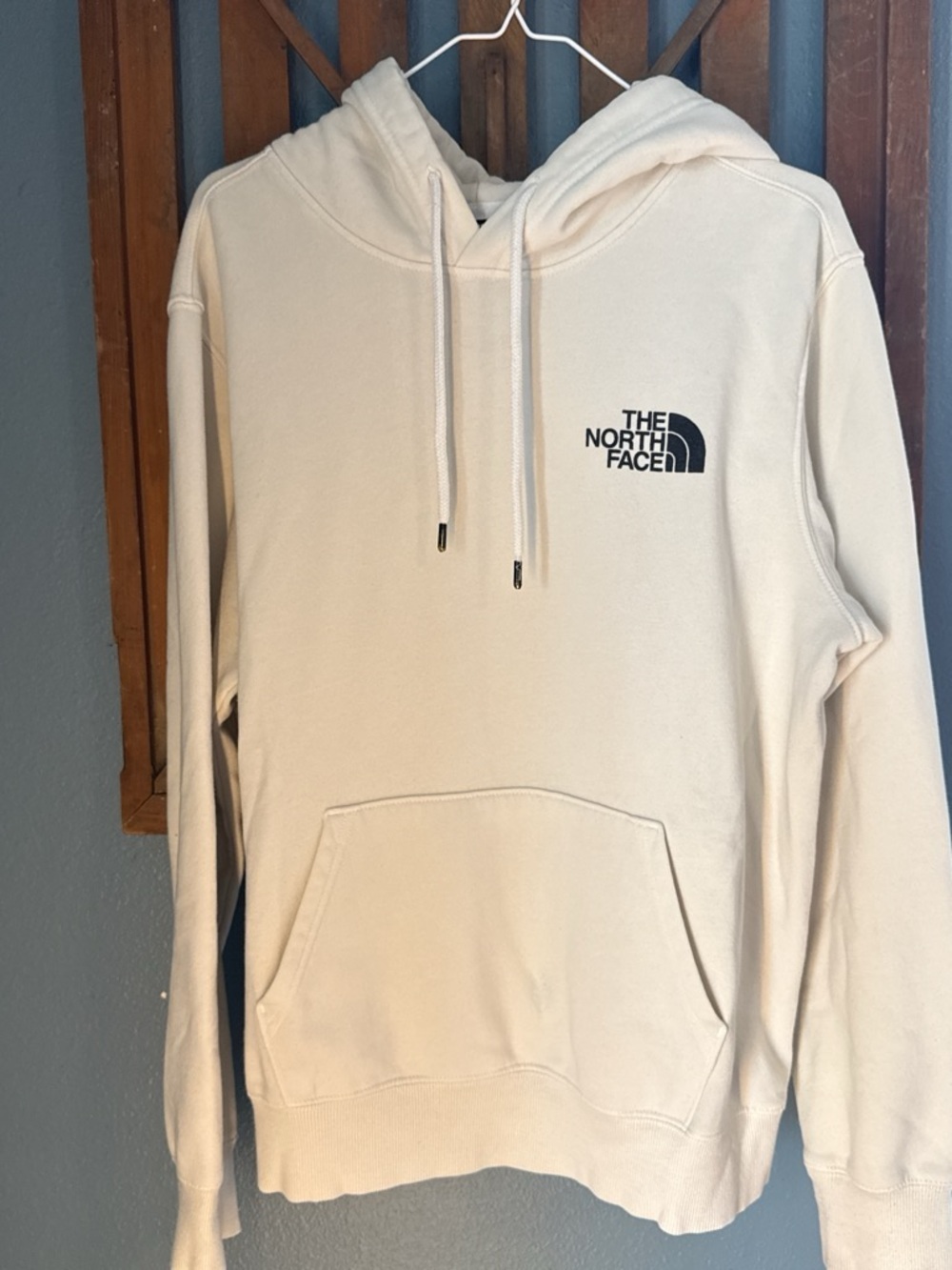 The North Face Men's Cream Pullover Hoodie with Black Logo